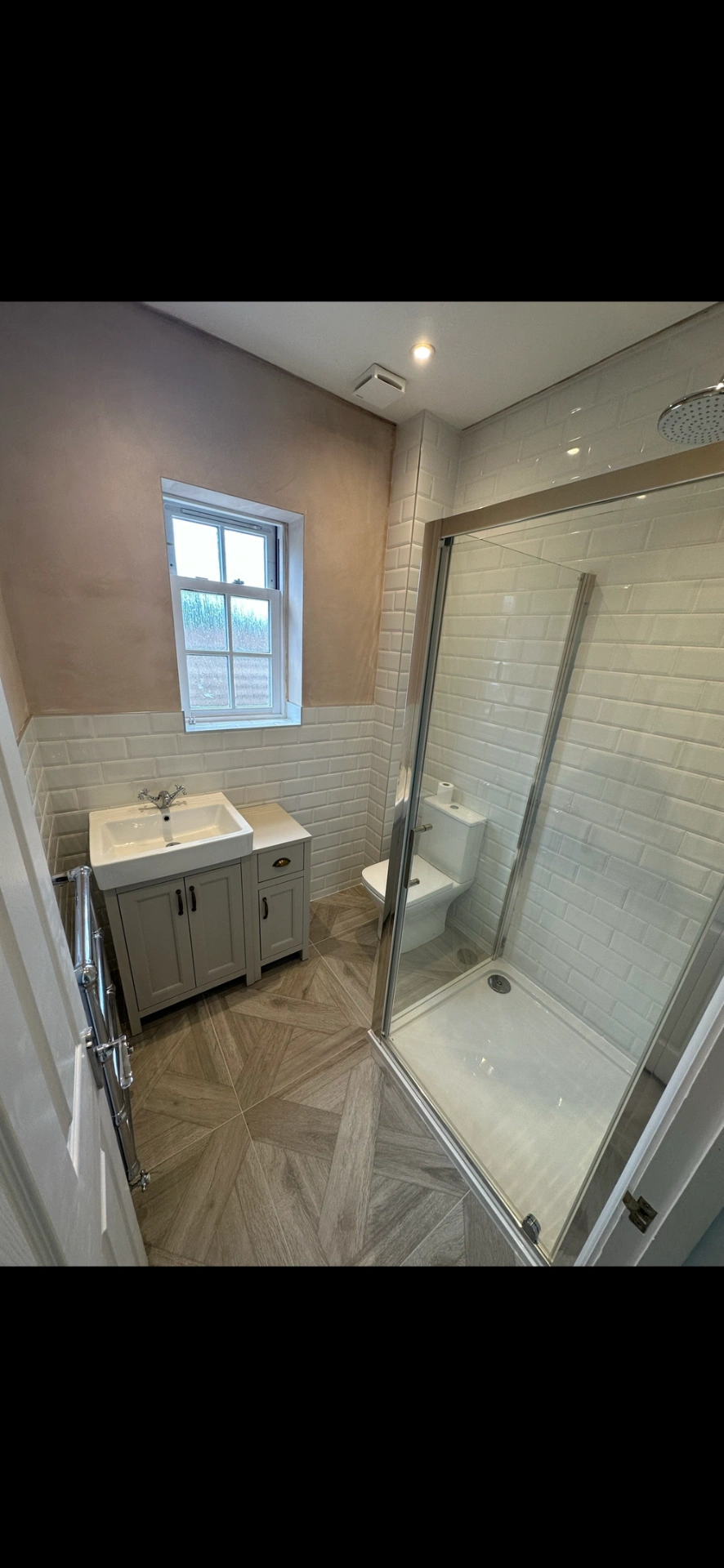 Traditional cloakroom shower room with grey shaker vanity, metro tiles and parquet floor — bathroom renovation Godalming